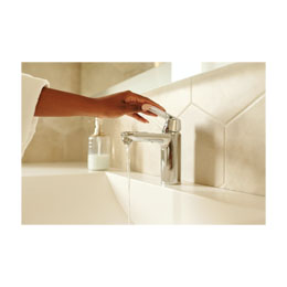 Image of a hand turning on a faucet to indicate how Reyolds Water provides regular equipment maintenance and services.